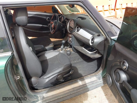 2013 MINI Cooper Hardtop with VIN WMWSU3C52DT690373, listed as a IAAI auction lot 41777229 with 125,190 mi miles. Bid and sale history available at carsss.com. Image 5.
