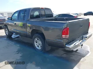 2001 Dodge Dakota z VIN 1B7HL2AX51S333575, wystawiony jako IAAI lot #41782582 z przebiegiem 291 640 mil mil oraz . Historia ofert i sprzedaży dostępna na DreamBid. Obrazek 3.
