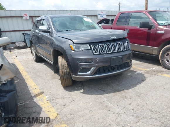 2020 Jeep Grand Cherokee Summit with VIN 1C4RJFJT0LC137054, listed as a IAAI auction lot 42235704 with 70,000 mi miles and . Bid and sale history available at DreamBid. Image 1.