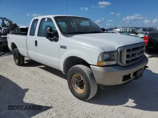 2004 Ford Super Duty F-250 XL with VIN 1FTNX21L74ED07583, listed as a Copart auction lot 74755474 with 227,029 mi miles and Salvage Title. Bid and sale history available at carsss.com. Image 4.