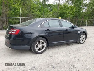 2013 Ford Taurus SEL z VIN 1FAHP2H84DG102036, wystawiony jako Copart lot #57772285 z przebiegiem 156 609 mil mil oraz Czysty tytuł • Clean title. Historia ofert i sprzedaży dostępna na DreamBid. Obrazek 3.