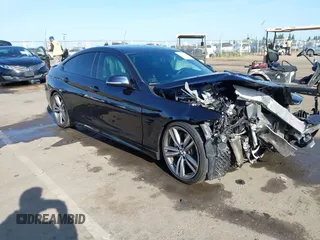 2015 BMW 4 Series 435i with VIN WBA4B1C54FD418309, listed as a IAAI auction lot 42099401 with 119,982 mi miles. Bid and sale history available at carsss.com. Image 1.