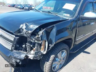 2009 Chevrolet Suburban LTZ with VIN 1GNFK36399J124158, listed as a IAAI auction lot 42063097 with 204,856 mi miles. Bid and sale history available at carsss.com. Image 6.