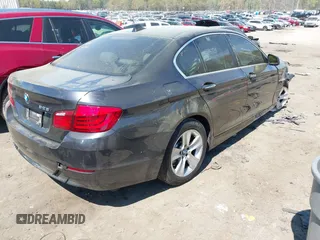 2012 BMW 5 Series 528i with VIN WBAXG5C58CDY28516, listed as a IAAI auction lot 41907803 with 116,499 mi miles. Bid and sale history available at carsss.com. Image 4.