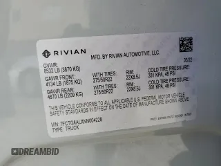 2022 Rivian R1T Launch Edition z VIN 7FCTGAALXNN004228, wystawiony jako Copart lot #43226985 z przebiegiem 4 mil mil oraz Szkody całkowita. Historia ofert i sprzedaży dostępna na DreamBid. Obrazek 13.