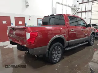 2017 Nissan Titan SV with VIN 1N6AA1E53HN529594, listed as a IAAI auction lot 41479406 with 121,715 mi miles and . Bid and sale history available at DreamBid. Image 4.