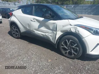 2019 Toyota C-HR XLE with VIN NMTKHMBX5KR097682, listed as a IAAI auction lot 42145372 with 11,003 mi miles and . Bid and sale history available at DreamBid. Image 6.