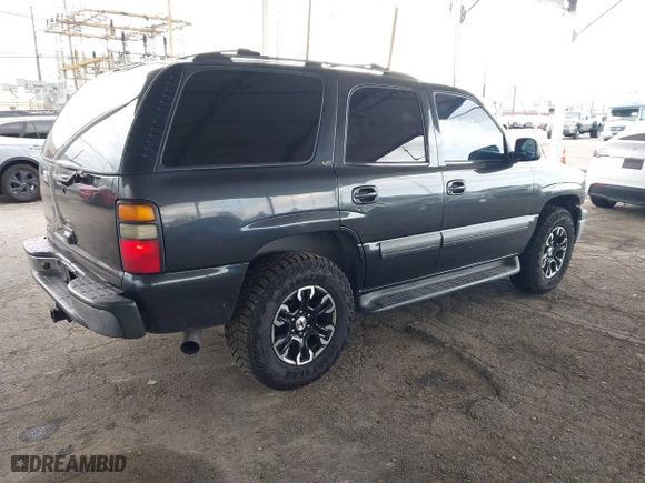 2003 Chevrolet Tahoe LS with VIN 1GNEC13T83R282176, listed as a IAAI auction lot 41815032 with 173,001 mi miles. Bid and sale history available at carsss.com. Image 4.