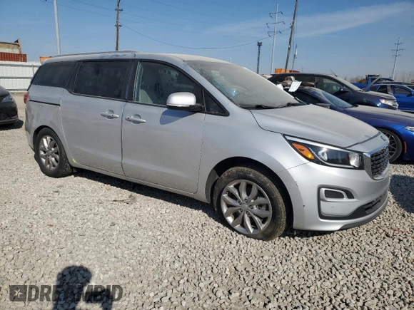 2021 Kia Sedona LX with VIN KNDMB5C17M6664764, listed as a Copart auction lot 48717575 with 70,099 mi miles and Salvage Title. Bid and sale history available at carsss.com. Image 4.