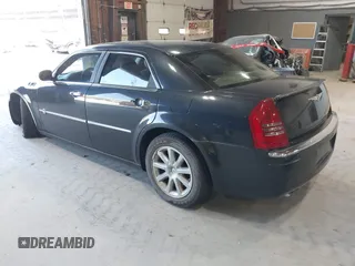 2006 Chrysler 300 C with VIN 2C3KA63H06H421414, listed as a IAAI auction lot 42144274 with 118,692 mi miles. Bid and sale history available at carsss.com. Image 3.