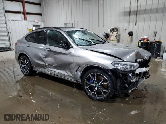 2021 BMW X4 M z VIN 5YMUJ0C05M9E04935, wystawiony jako Copart lot #42149535 z przebiegiem Nie podano mil oraz Szkody całkowita. Historia ofert i sprzedaży dostępna na DreamBid. Obrazek 4.