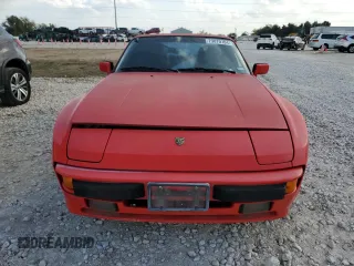 1987 Porsche 944 z VIN WP0AB0946HN476255, wystawiony jako Copart lot #79870704 z przebiegiem 177 672 mil mil oraz Czysty tytuł • Clean title. Historia ofert i sprzedaży dostępna na DreamBid. Obrazek 5.