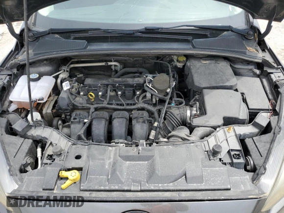 2015 Ford Focus Titanium z VIN 1FADP3N2XFL357224, wystawiony jako Copart lot #55626575 z przebiegiem 159 422 mil mil oraz Szkoda całkowita • Salvage title. Historia ofert i sprzedaży dostępna na DreamBid. Obrazek 11.