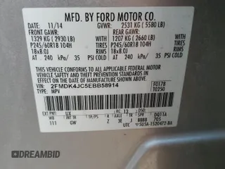 2014 Ford Edge SEL z VIN 2FMDK4JC5EBB58914, wystawiony jako Copart lot #58788645 z przebiegiem 252 695 mil mil oraz Szkoda całkowita • Salvage title. Historia ofert i sprzedaży dostępna na DreamBid. Obrazek 13.