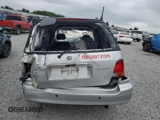 1997 Honda Odyssey z VIN RA21211409, wystawiony jako Copart lot #62449015 z przebiegiem Nie podano mil oraz Szkoda całkowita • Salvage title. Historia ofert i sprzedaży dostępna na DreamBid. Obrazek 6.