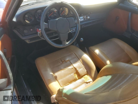 1974 Porsche 911 with VIN 9114111882, listed as a Copart auction lot 47080465 with 4,828 mi miles and Salvage title. Bid and sale history available at DreamBid. Image 8.