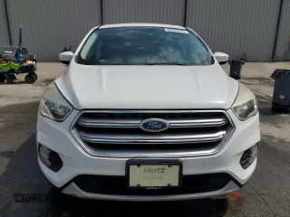 2017 Ford Escape SE z VIN 1FMCU0GD9HUE38848, wystawiony jako Copart lot #56859745 z przebiegiem 69 404 mil mil oraz Szkoda całkowita • Salvage title. Historia ofert i sprzedaży dostępna na DreamBid. Obrazek 5.