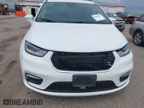 2022 Chrysler Pacifica Touring L with VIN 2C4RC1BG5NR170186, listed as a IAAI auction lot 41422057 with 71,204 mi miles and . Bid and sale history available at DreamBid. Image 6.