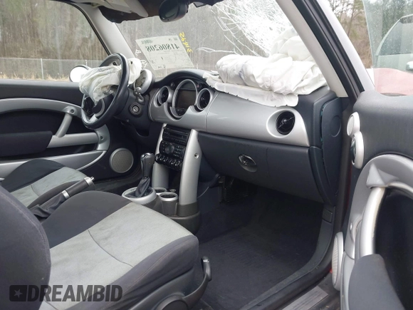 2005 MINI Hardtop with VIN WMWRC33485TJ67837, listed as a IAAI auction lot 41806208 with 140,646 mi miles and . Bid and sale history available at DreamBid. Image 5.