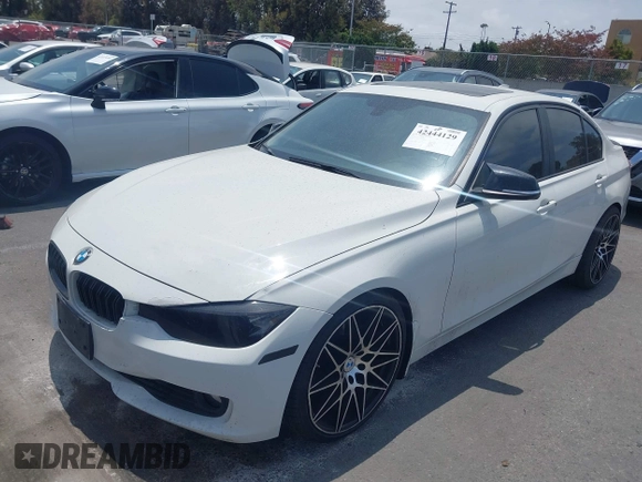 2014 BMW 3 Series 328i with VIN WBA3C1C52EK110753, listed as a IAAI auction lot 42444129 with 169,035 mi miles and . Bid and sale history available at DreamBid. Image 2.