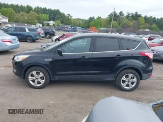 2016 Ford Escape SE with VIN 1FMCU9G96GUC31705, listed as a IAAI auction lot 42251216 with 118,270 mi miles and . Bid and sale history available at DreamBid. Image 14.