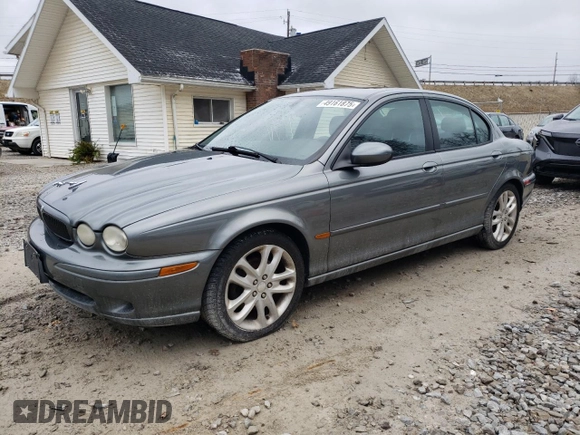 2004 Jaguar X-Type with VIN SAJEA51C24WE00125, listed as a Copart auction lot 49161875 with 80,890 mi miles and Clean Title. Bid and sale history available at DreamBid. Image 1.