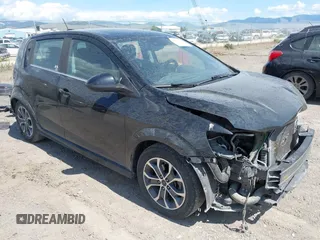 2020 Chevrolet Sonic LT with VIN 1G1JD6SB9L4104387, listed as a IAAI auction lot 42356127 with 125,111 mi miles and . Bid and sale history available at DreamBid. Image 1.