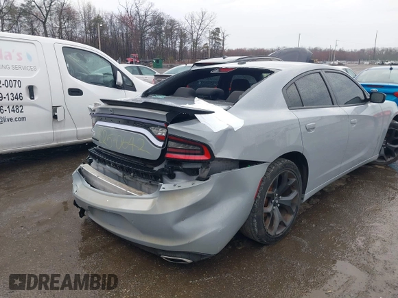 2020 Dodge Charger SXT with VIN 2C3CDXBG6LH234541, listed as a IAAI auction lot 41853444 with 119,582 mi miles. Bid and sale history available at carsss.com. Image 4.