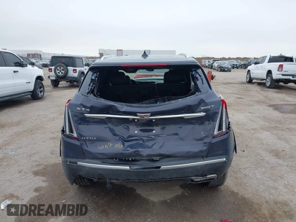 2024 Cadillac XT5 FWD Premium Luxury with VIN 1GYKNCR47RZ755652, listed as a IAAI auction lot 41512069 with 10,243 mi miles. Bid and sale history available at carsss.com. Image 16.