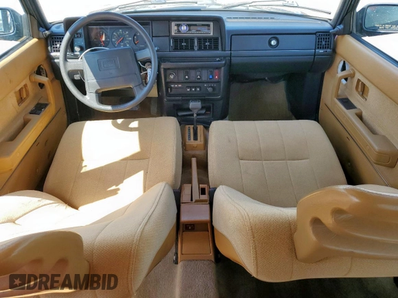 1992 Volvo 240 z VIN YV1AS8805N1467833, wystawiony jako Copart lot #51828515 z przebiegiem 178 826 mil mil oraz Szkoda całkowita • Salvage title. Historia ofert i sprzedaży dostępna na DreamBid. Obrazek 8.