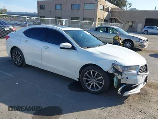 2020 Acura TLX with VIN 19UUB1F3XLA014040, listed as a IAAI auction lot 42385420 with 140,740 mi miles and . Bid and sale history available at DreamBid. Image 1.