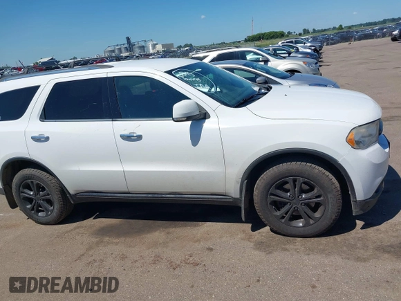2013 Dodge Durango Crew with VIN 1C4RDJDG8DC664544, listed as a IAAI auction lot 42608957 with 202,564 mi miles and . Bid and sale history available at DreamBid. Image 13.