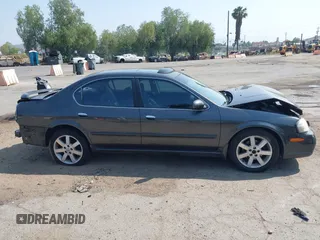 2003 Nissan Maxima GLE z VIN JN1DA31A23T427063, wystawiony jako IAAI lot #42450037 z przebiegiem 166 531 mil mil oraz . Historia ofert i sprzedaży dostępna na DreamBid. Obrazek 12.