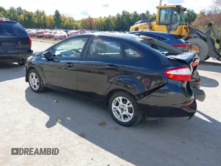 2015 Ford Fiesta SE with VIN 3FADP4BJXFM189438, listed as a IAAI auction lot 40535245 with 102,013 mi miles. Bid and sale history available at carsss.com. Image 3.
