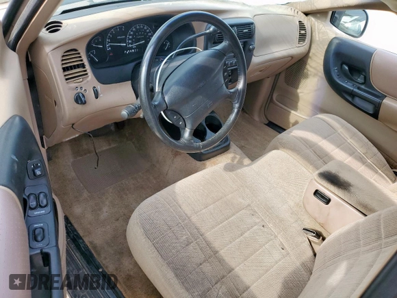 1997 Ford Ranger XLT with VIN 1FTCR14X3VPA62832, listed as a Copart auction lot 54961095 with 144,259 mi miles and Salvage title. Bid and sale history available at DreamBid. Image 8.
