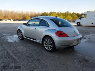 2012 Volkswagen Beetle 2.5L PZEV with VIN 3VWJP7AT9CM602606, listed as a IAAI auction lot 41503442 with 1 mi miles. Bid and sale history available at carsss.com. Image 3.