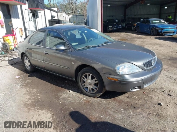 2004 Mercury Sable LS Premium z VIN 1MEHM55S54G607845, wystawiony jako IAAI lot #41812758 z przebiegiem 200 883 mil mil oraz . Historia ofert i sprzedaży dostępna na DreamBid. Obrazek 1.