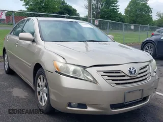 2009 Toyota Camry LE z VIN 4T1BK46KX9U089242, wystawiony jako IAAI lot #42448998 z przebiegiem 252 787 mil mil oraz . Historia ofert i sprzedaży dostępna na DreamBid. Obrazek 1.