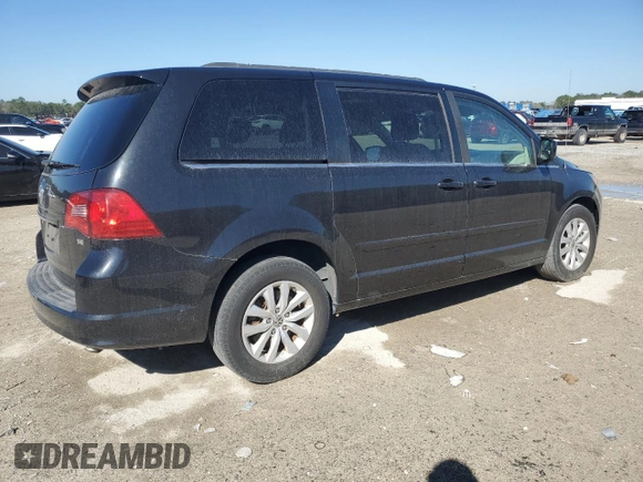 2014 Volkswagen Routan SE with VIN 2C4RVABG9ER135273, listed as a Copart auction lot 45343575 with 94,528 mi miles and Salvage title. Bid and sale history available at DreamBid. Image 3.