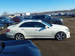 2012 Mercedes-Benz E-Class E 350 Luxury with VIN WDDHF8JB1CA618951, listed as a IAAI auction lot 41651716 with 143,221 mi miles. Bid and sale history available at carsss.com. Image 13.