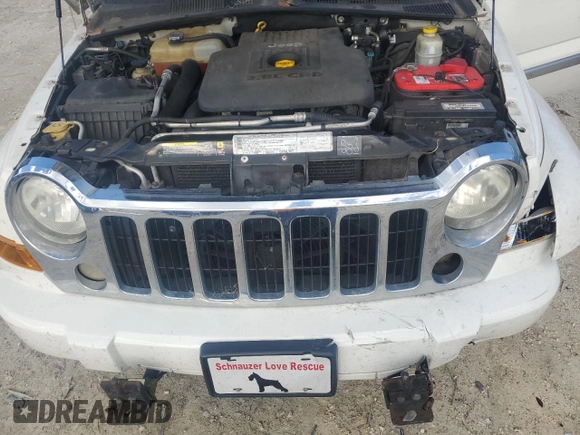 2006 Jeep Liberty Limited z VIN 1J4GL58576W101121, wystawiony jako Copart lot #84593434 z przebiegiem 102 469 mil mil oraz Szkoda całkowita • Salvage title. Historia ofert i sprzedaży dostępna na DreamBid. Obrazek 11.