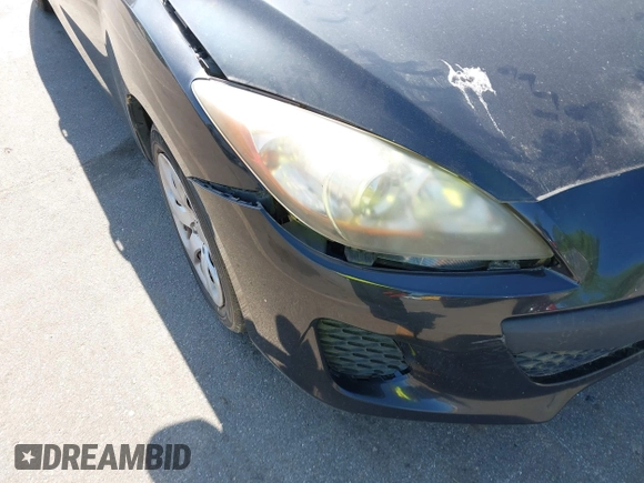 2013 Mazda 3 i SV with VIN JM1BL1TG9D1811438, listed as a IAAI auction lot 42185413 with 182,261 mi miles. Bid and sale history available at carsss.com. Image 6.