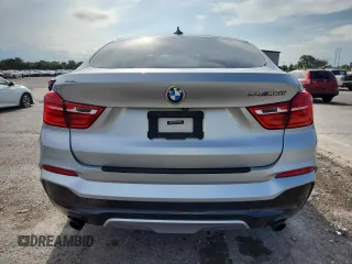 2017 BMW X4 M40i with VIN 5UXXW7C36H0U26510, listed as a Copart auction lot 62700515 with Not provided miles and Salvage title. Bid and sale history available at DreamBid. Image 6.