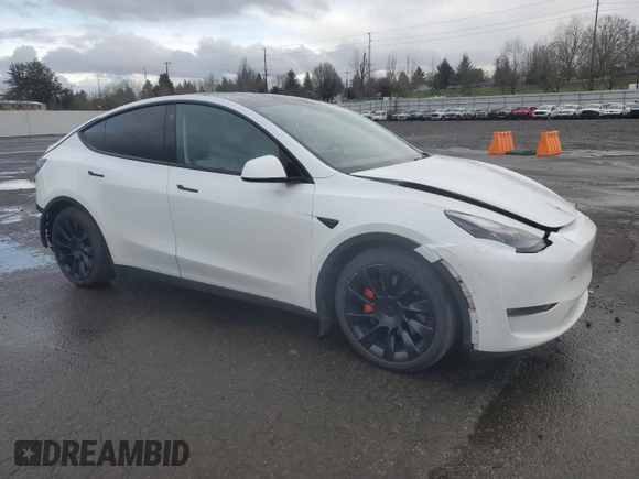 2022 Tesla Model Y Performance with VIN 7SAYGDEFXNF455517, listed as a Copart auction lot 44147905 with 32,210 mi miles and Salvage title. Bid and sale history available at DreamBid. Image 4.