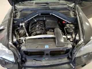 2011 BMW X5 35i z VIN 5UXZV4C52BL743475, wystawiony jako Copart lot #56238615 z przebiegiem 218 738 mil mil oraz Szkoda całkowita • Salvage title. Historia ofert i sprzedaży dostępna na DreamBid. Obrazek 12.
