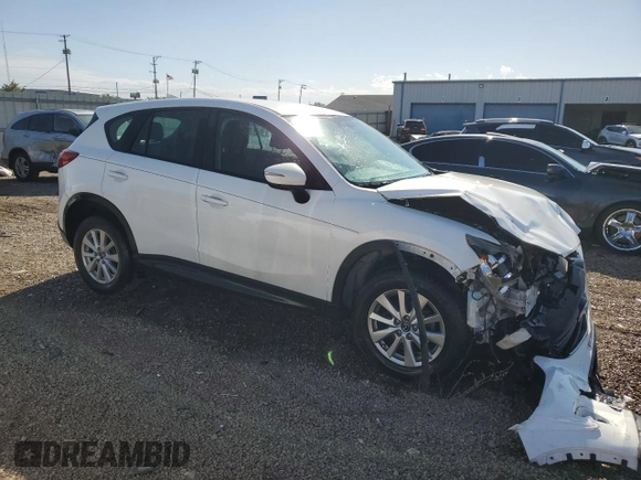 2016 Mazda CX-5 Sport с VIN JM3KE4BY1G0611368, выставлен на аукционе Copart как лот 56979385 с пробегом 106 397 миль миль и Списание • Salvage title. История ставок и продаж доступна на DreamBid. Изображение 4.