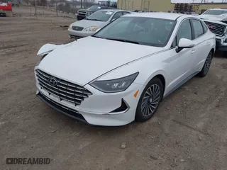2021 Hyundai Sonata Hybrid SEL with VIN KMHL34JJ7MA032703, listed as a IAAI auction lot 41252575 with 22,067 mi miles. Bid and sale history available at carsss.com. Image 17.
