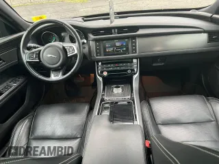 2016 Jaguar XF S with VIN SAJBM4BV0GCY13846, listed as a Copart auction lot 80396964 with 104,657 mi miles and Clean Title. Bid and sale history available at carsss.com. Image 9.