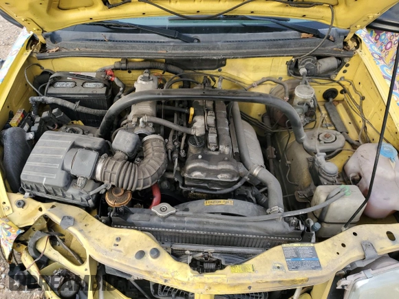 2003 Chevrolet Tracker z VIN 2CNBE18C136928311, wystawiony jako Copart lot #84463154 z przebiegiem 118 195 mil mil oraz Szkoda całkowita • Salvage title. Historia ofert i sprzedaży dostępna na DreamBid. Obrazek 12.