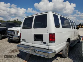 2009 Ford Econoline Passenger XL with VIN 1FBSS31L99DA06824, listed as a Copart auction lot 73740824 with 147,528 mi miles and Salvage title. Bid and sale history available at DreamBid. Image 3.
